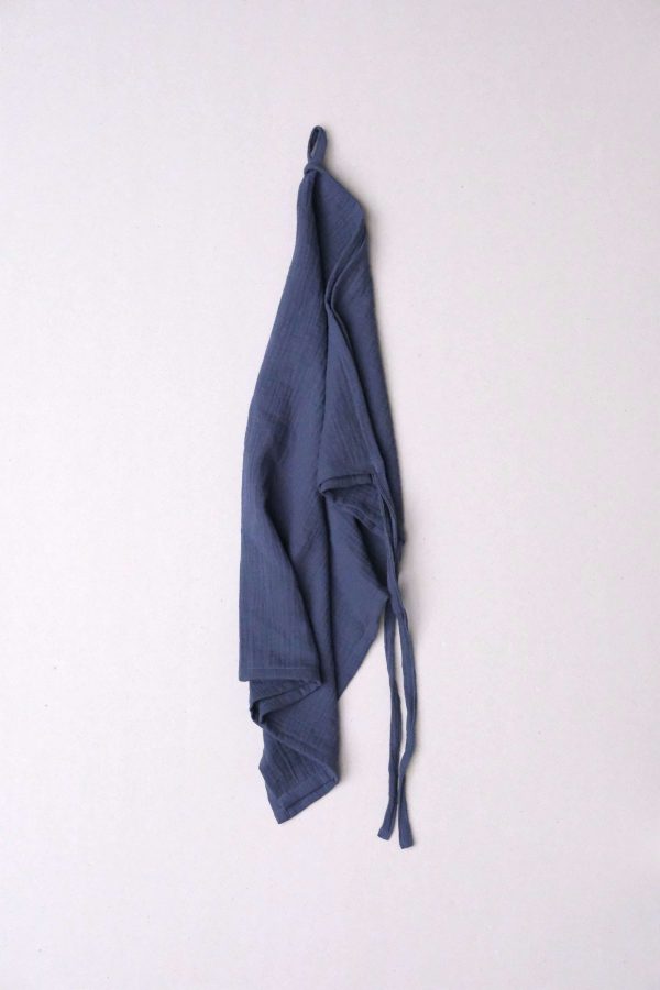 flatlay of the muslin gauze cotton dishtowel in Blue by the brand Cats and Boys