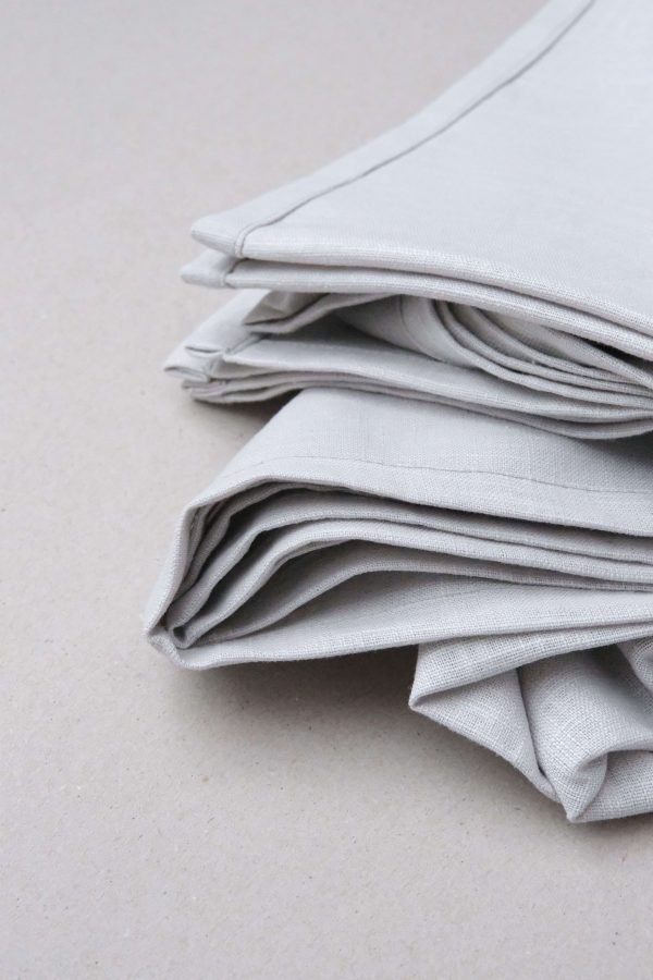 flatlay of the linen table cloth in light grey by the brand Cats and Boys