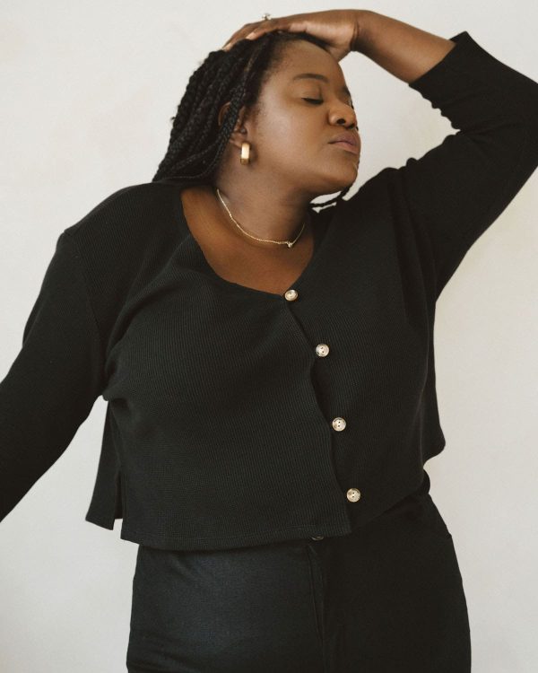 woman wearing the organic cotton waffle James Blouse in Black by the brand Harly Jae