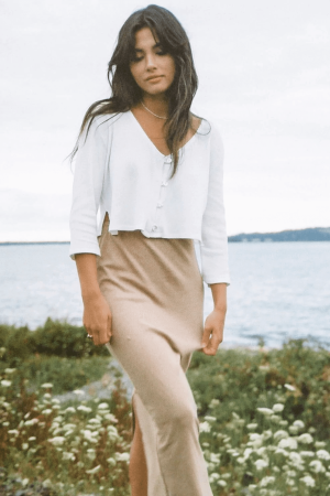 woman wearing the organic cotton Kea Skirt & James Blouse in Camel by the brand Harly Jae