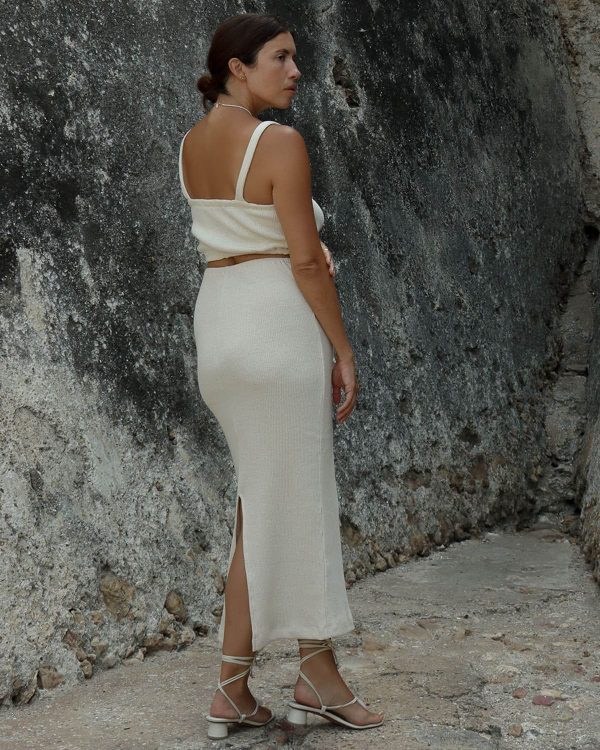 woman wearing the organic hemp & cotton Kea Skirt in Off-White by the brand Harly Jae