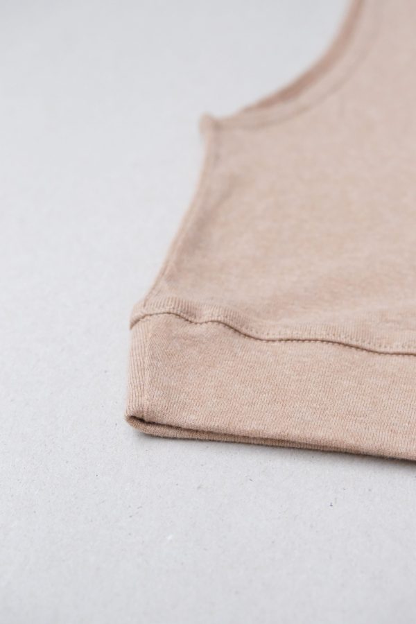 flatlay of the organic cotton Kea Top in Camel by the brand Harly Jae