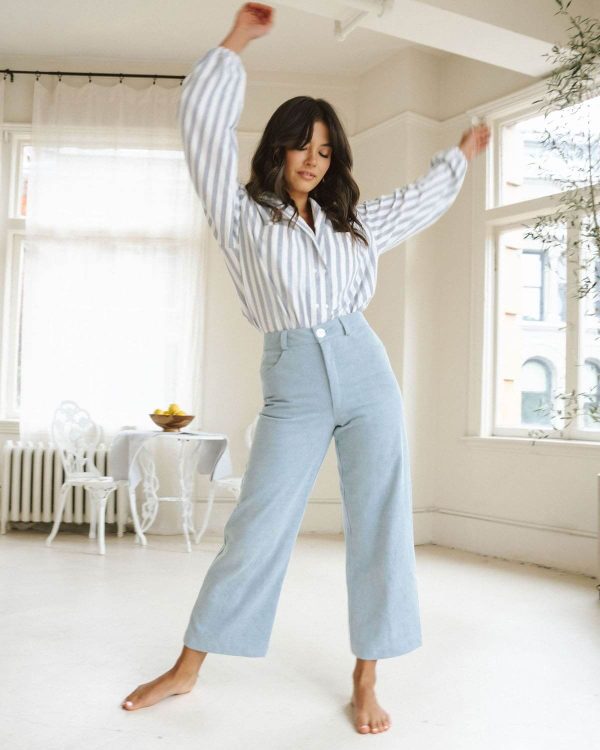 woman wearing the organic cotton Pierrot Pants in Light Denim by the brand Harly Jae