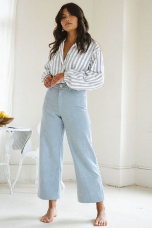 woman wearing the organic cotton Pierrot Pants in Light Denim by the brand Harly Jae