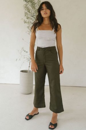 woman wearing the organic cotton & hemp Pierrot Pants in Olive by the brand Harly Jae