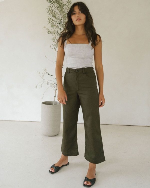 woman wearing the organic cotton & hemp Pierrot Pants in Olive by the brand Harly Jae