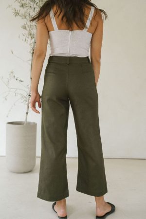 woman wearing the organic cotton & hemp Pierrot Pants in Olive by the brand Harly Jae