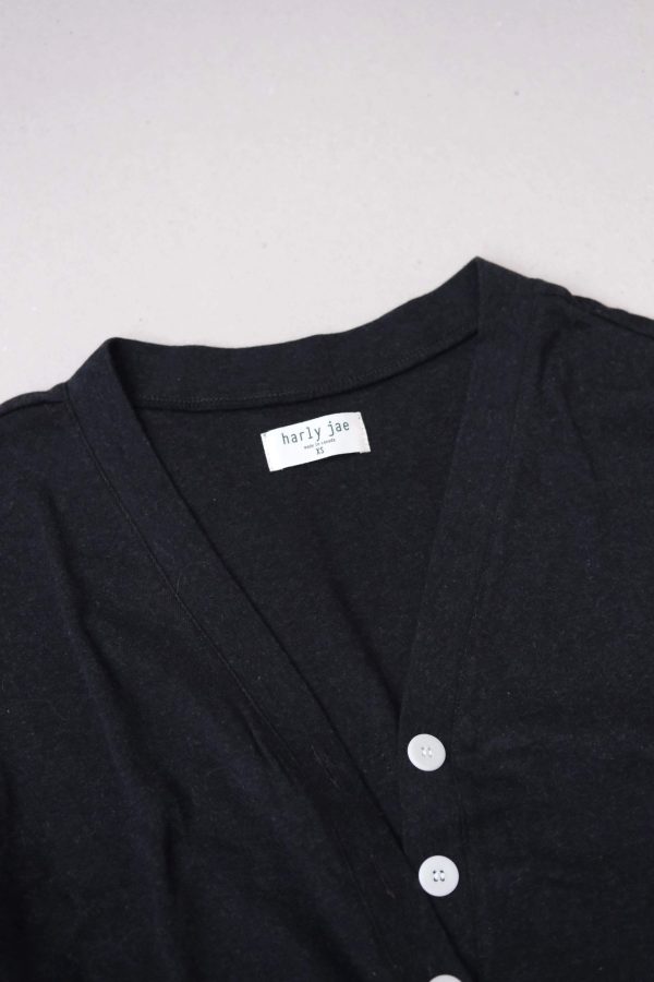 flatlay of the organic cotton Porto Henley in Charcoal by the brand Harly Jae