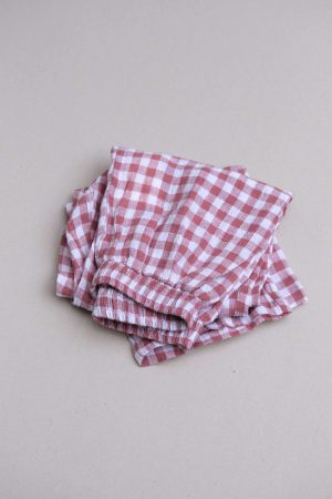 the Mia Pants in Cherry Gingham by the brand The Bare Road