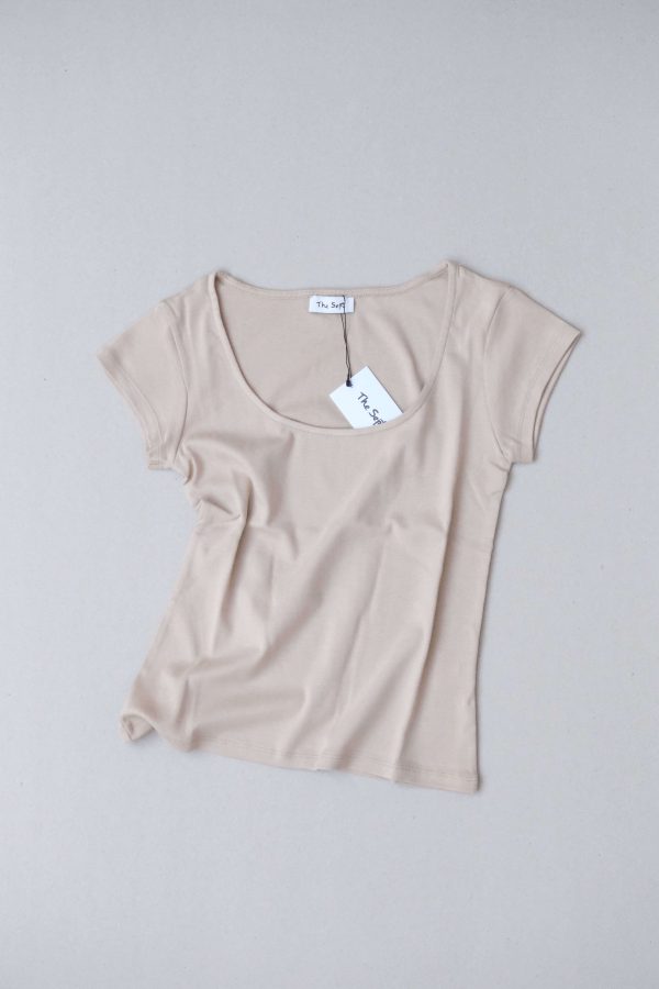 flatlay of the Emma Tee in Almond by the brand The Sept