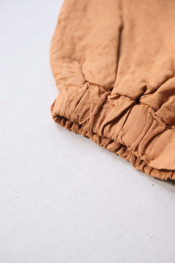 flatlay of the Gabrielle Shorts in Caramel by the brand The Sept