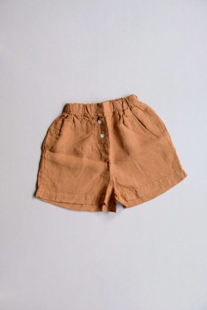 flatlay of the Gabrielle Shorts in Caramel by the brand The Sept