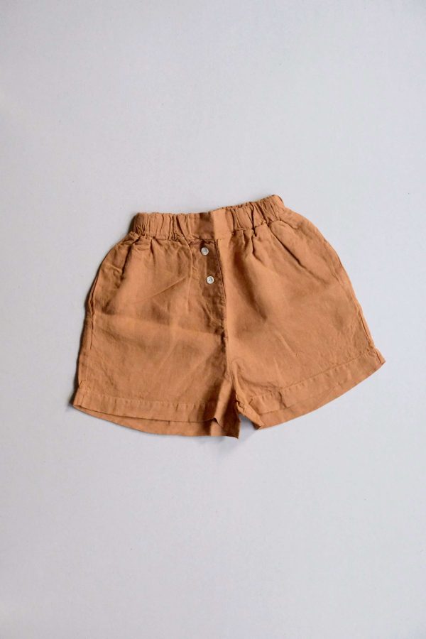 flatlay of the Gabrielle Shorts in Caramel by the brand The Sept