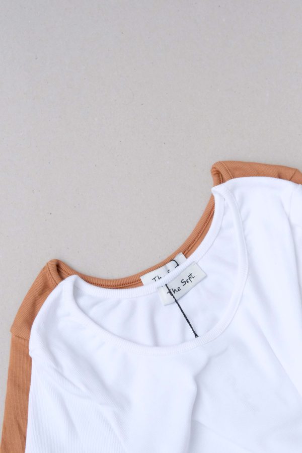 flatlay of the Mel Longsleeve in white & caramel by the brand The Sept