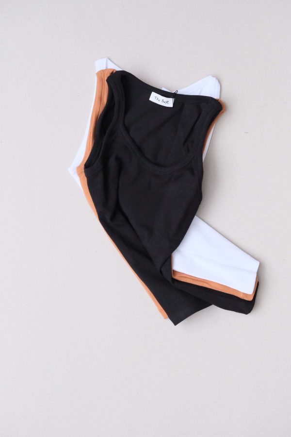 the Rachel 90s Tank in black, caramel & white by the brand The Sept