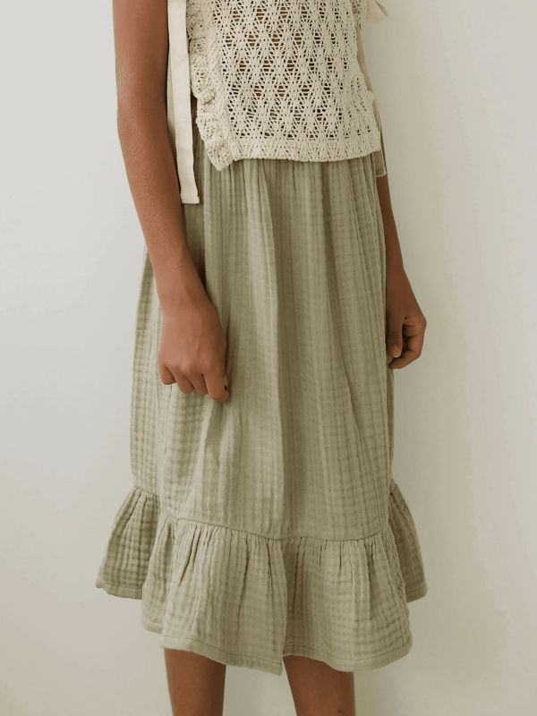 the Claudia skirt in Dried Herb paired with the Nila Top by the brand Yoli and Otis