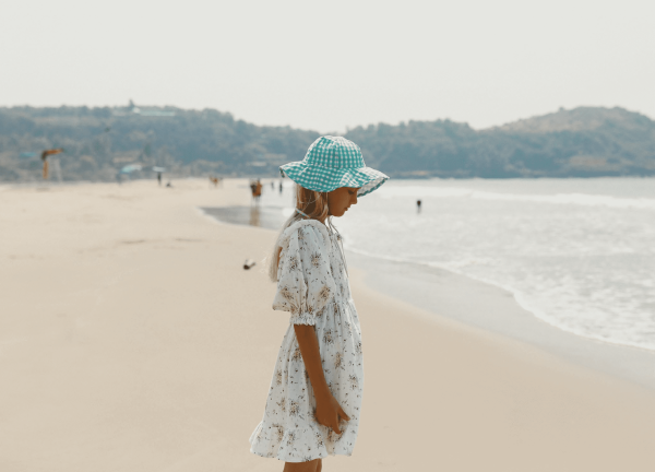 the Greta Dress in Vintage Floral by the brand Yoli & Otis