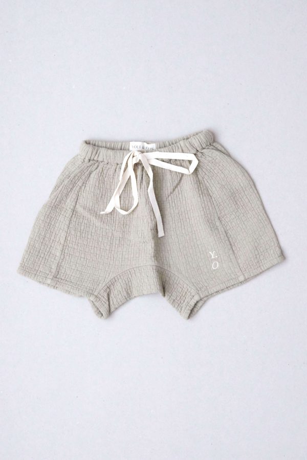 the Haru Shorts in Dried Herb by the brand Yoli & Otis