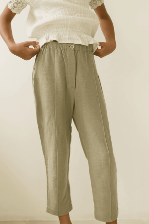 the Hassan Trousers in Dried Herb paired with the Dana Top by the brand Yoli & Otis