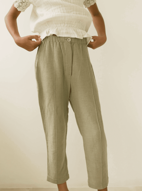 the Hassan Trousers in Dried Herb paired with the Dana Top by the brand Yoli & Otis
