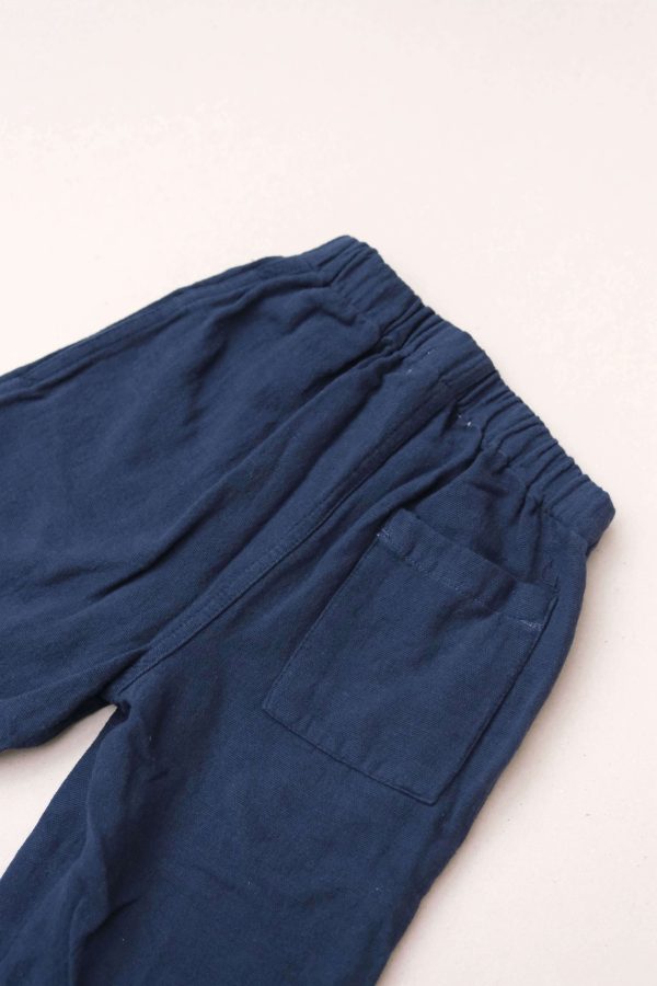 the Hassan Trousers in Navy by the brand Yoli & Otis