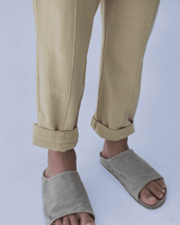 the Hassan Trousers in Parsnip by the brand Yoli & Otis