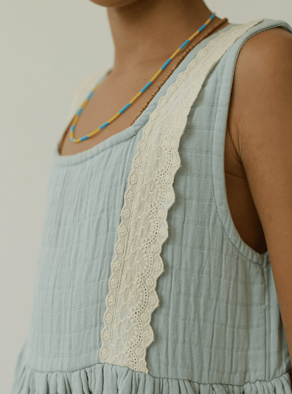 the Jamilah Dress in Duck Egg Blue by the brand Yoli & Otis