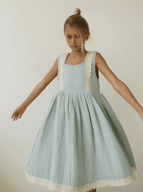 the Jamilah Dress in Duck Egg Blue by the brand Yoli & Otis