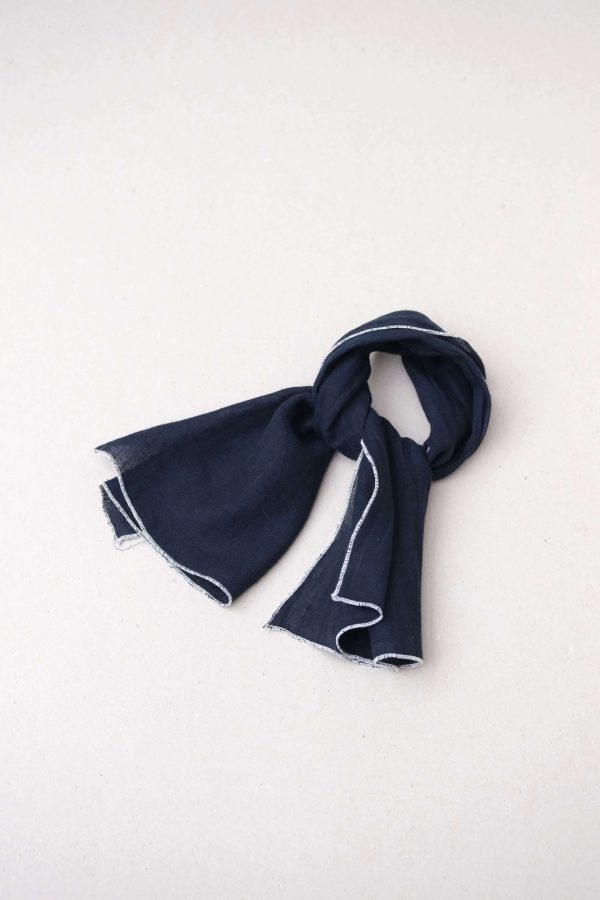 the Loretta Scarf in Navy with Off-white Stitch by the brand Yoli & Otis