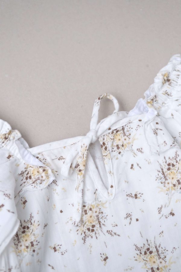 the Louilian blouse in Vintage Floral by the brand Yoli & Otis