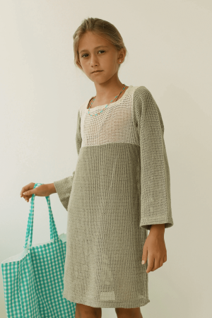 the Pippa Dress in Dried Herb paired with the Daphne Tote by the brand Yoli & Otis
