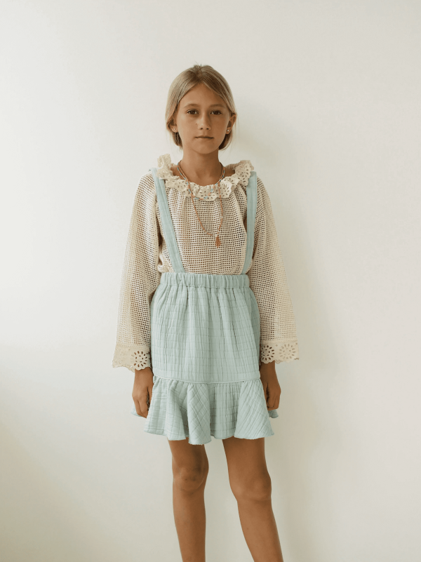 the Romeo Skirt in Duck Egg Blue paired with the Marya Blouse by the brand Yoli & Otis