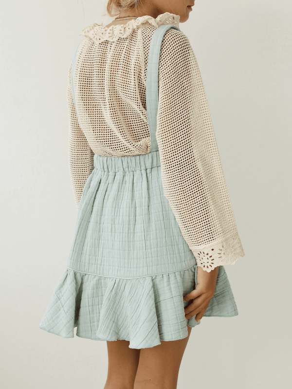 the Romeo Skirt in Duck Egg Blue paired with the Marya Blouse by the brand Yoli & Otis