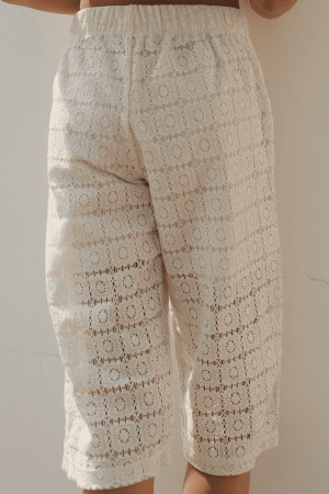 the Tallan Trousers in Undyed Crochet by the brand Yoli & Otis