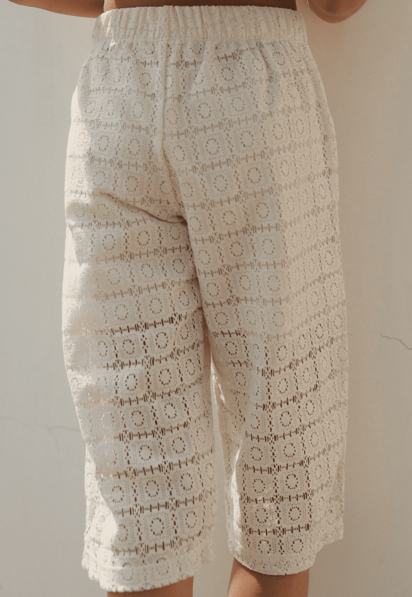 the Tallan Trousers in Undyed Crochet by the brand Yoli & Otis