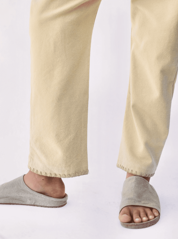 the Valan Trousers in Parsnip by the brand Yoli & Otis