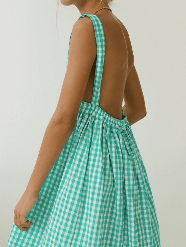 the Valeriane Dress in Apple Plaid by the brand Yoli & Otis