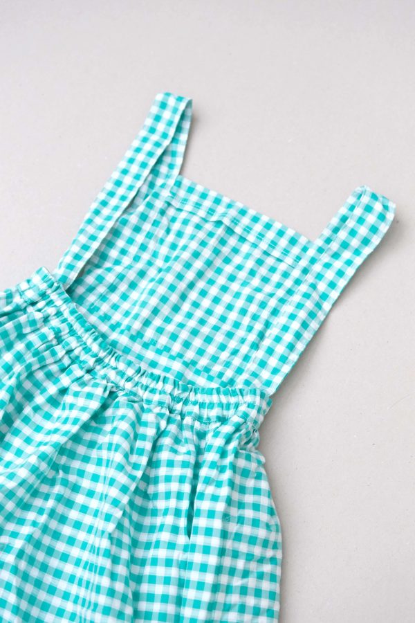 the Valeriane Dress in Apple Plaid by the brand Yoli & Otis