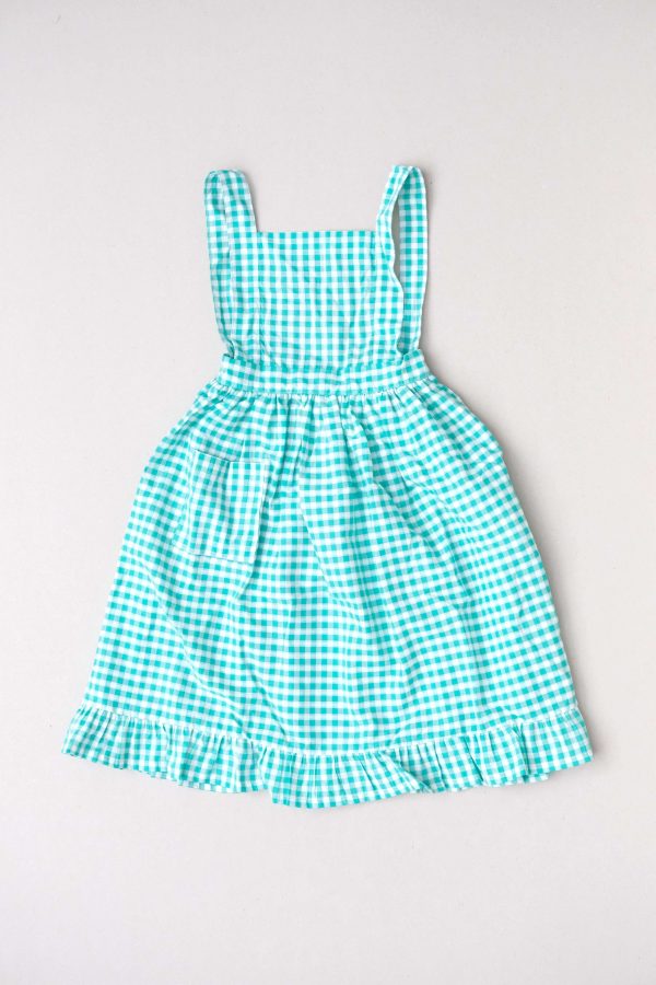 the Valeriane Dress in Apple Plaid by the brand Yoli & Otis