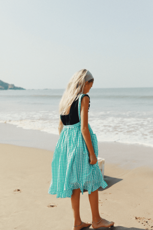 the Valeriane Dress in Apple Plaid by the brand Yoli & Otis