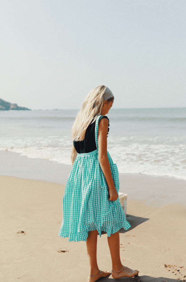 the Valeriane Dress in Apple Plaid by the brand Yoli & Otis