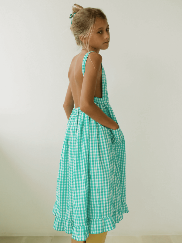 the Valeriane Dress in Apple Plaid by the brand Yoli & Otis