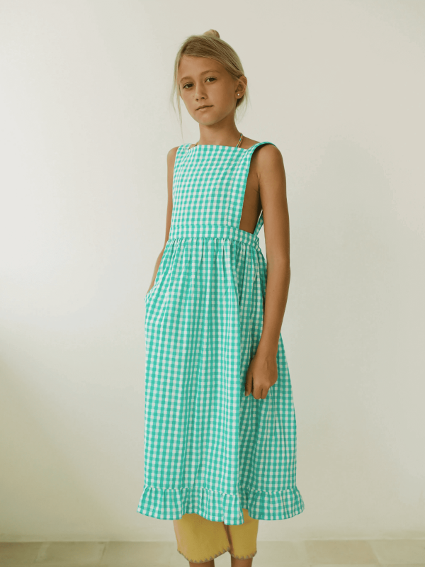 the Valeriane Dress in Apple Plaid by the brand Yoli & Otis