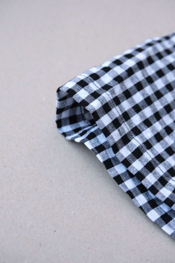 the Maddie Shorts in Black Gingham by the brand The Bare Road