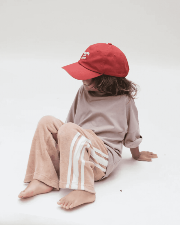 the Oversized Tee in Mushroom & the Racer Terry pants in Peach by the brand Summer and Storm