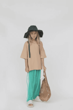 the Racer Terry Wide Leg Pants in Green by the brand Summer and Storm