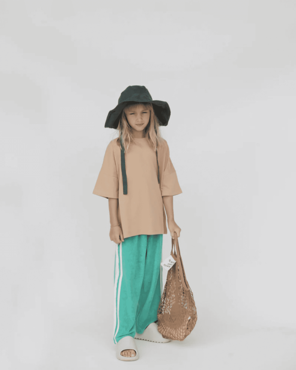 the Racer Terry Wide Leg Pants in Green by the brand Summer and Storm