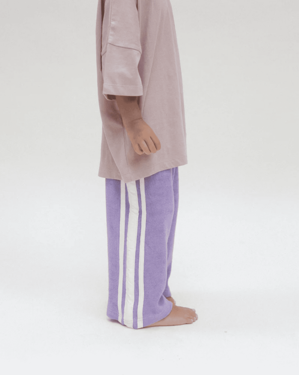 the Racer Terry Wide Leg Pants in Purple & the Oversized Tee in Mushroom by the brand Summer and Storm