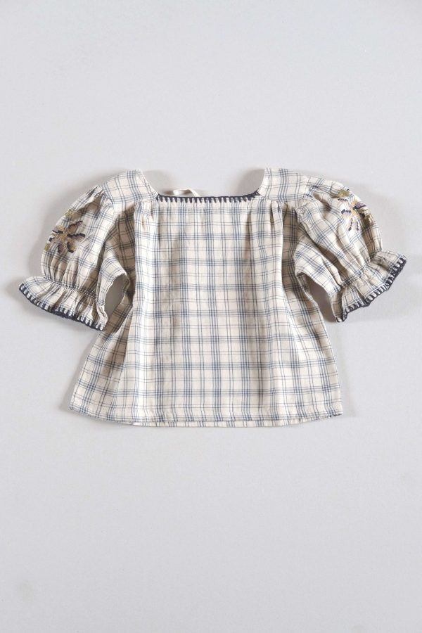 the organic cotton Estella Blouse in Tattersall Check by the brand LiiLU