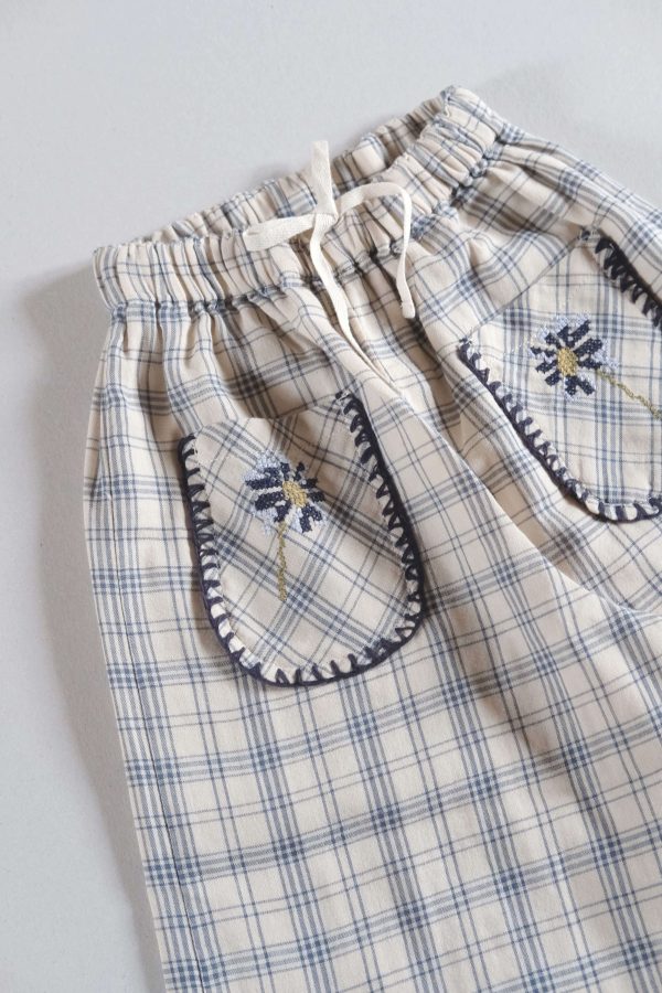the organic cotton Lilo Pants in Tattersall check by the brand LiiLU